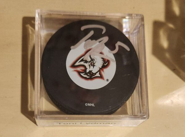 Toni Lydman Autographed Puck