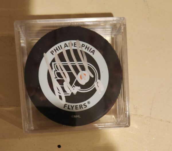 John LeClair Autographed Puck