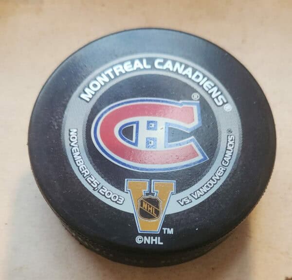 NHL Montreal Canadiens vs Vancouver Canucks vintage game puck Nov 23, 2003