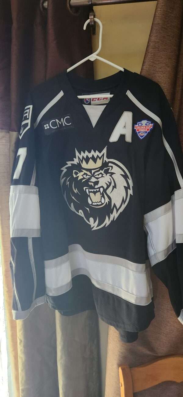 Manchester Monarchs Bodnarchuk #7 "A" Black CCM airknit size 56 with The CMC patch along with the 2015 Calder Finals patch, photo matched Autographed on back number $1250