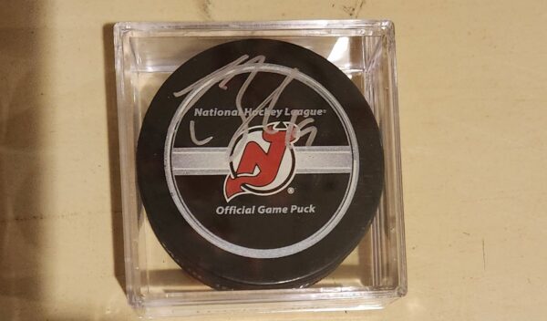 Travis Zajac Autographed Puck