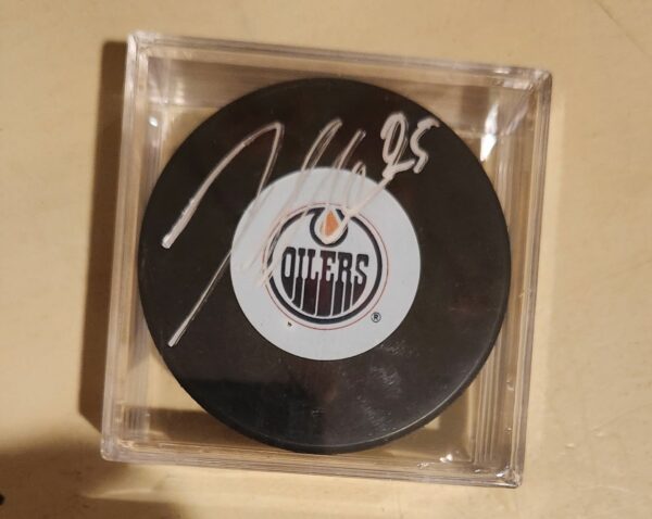 Joni Pitkanen Autographed Puck